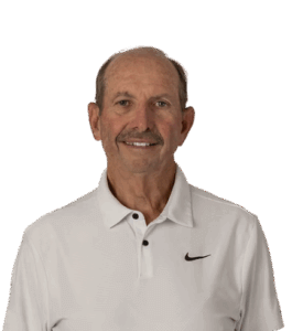 Smiling older man with short hair and mustache
