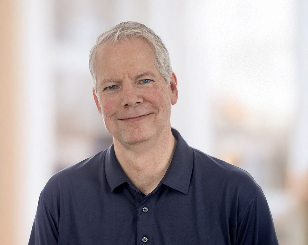 Headshot of John Gill, Executive Vice President of Business Development at Kaseware.